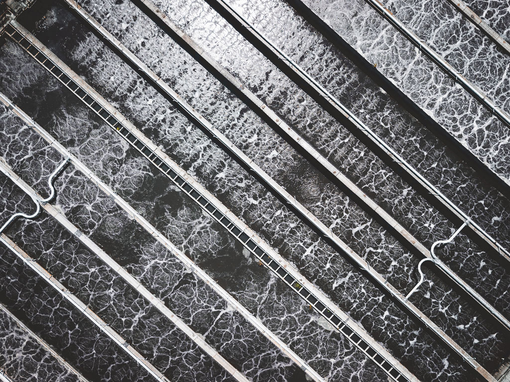 Aerial shot of wastewater treatment oxidation ponds