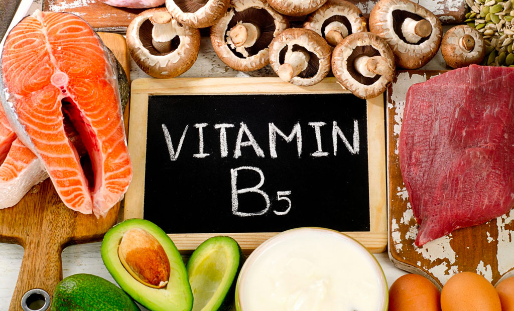 Sign saying vitamin b5 surrounded by different foods